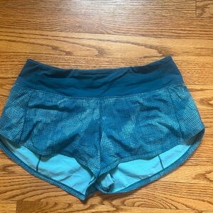 Teal Lululemon speed-up shorts size 4